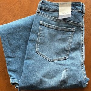 Style & Co skinny high rise distressed jeans.
